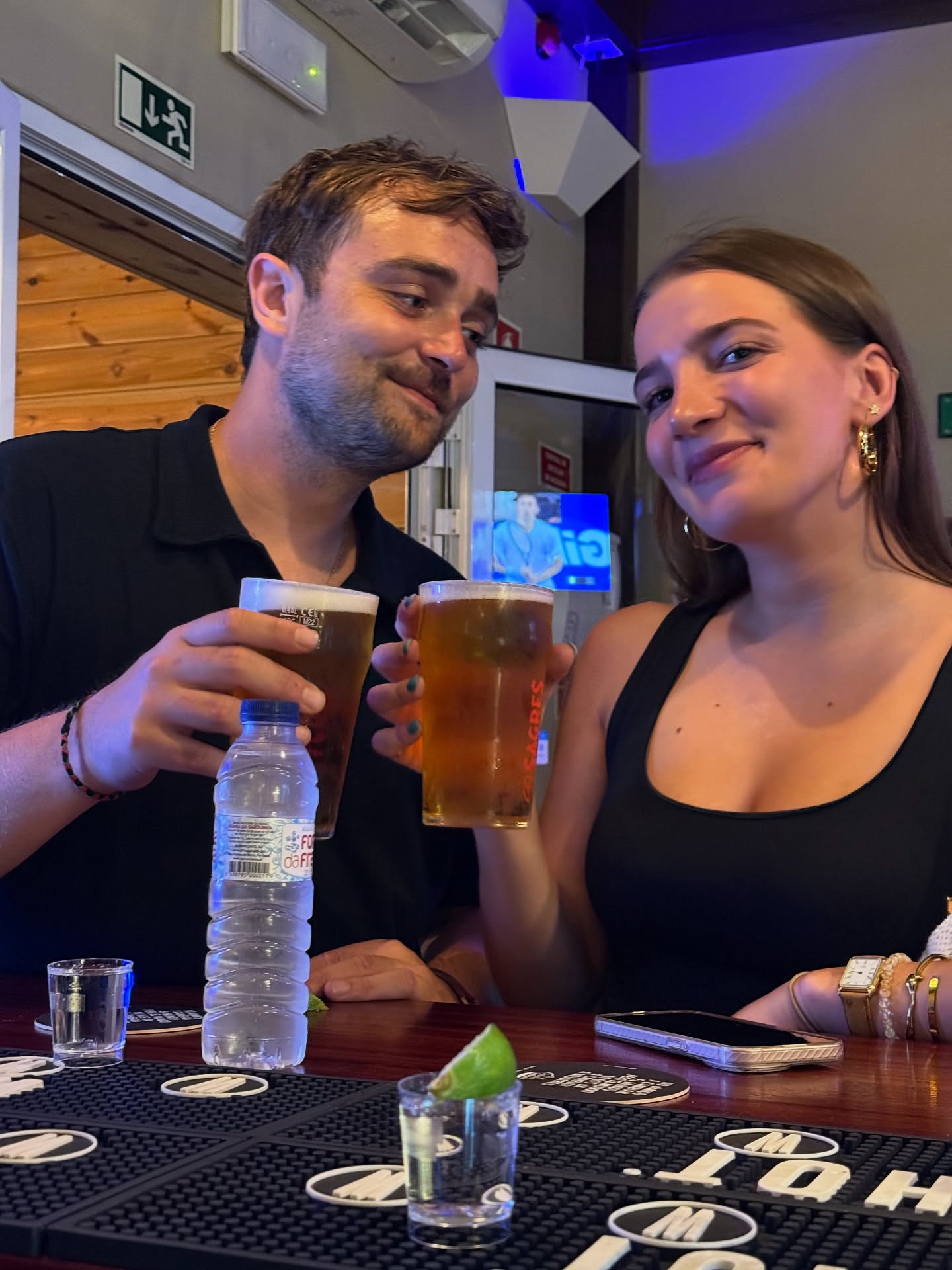 Friends cheering beers