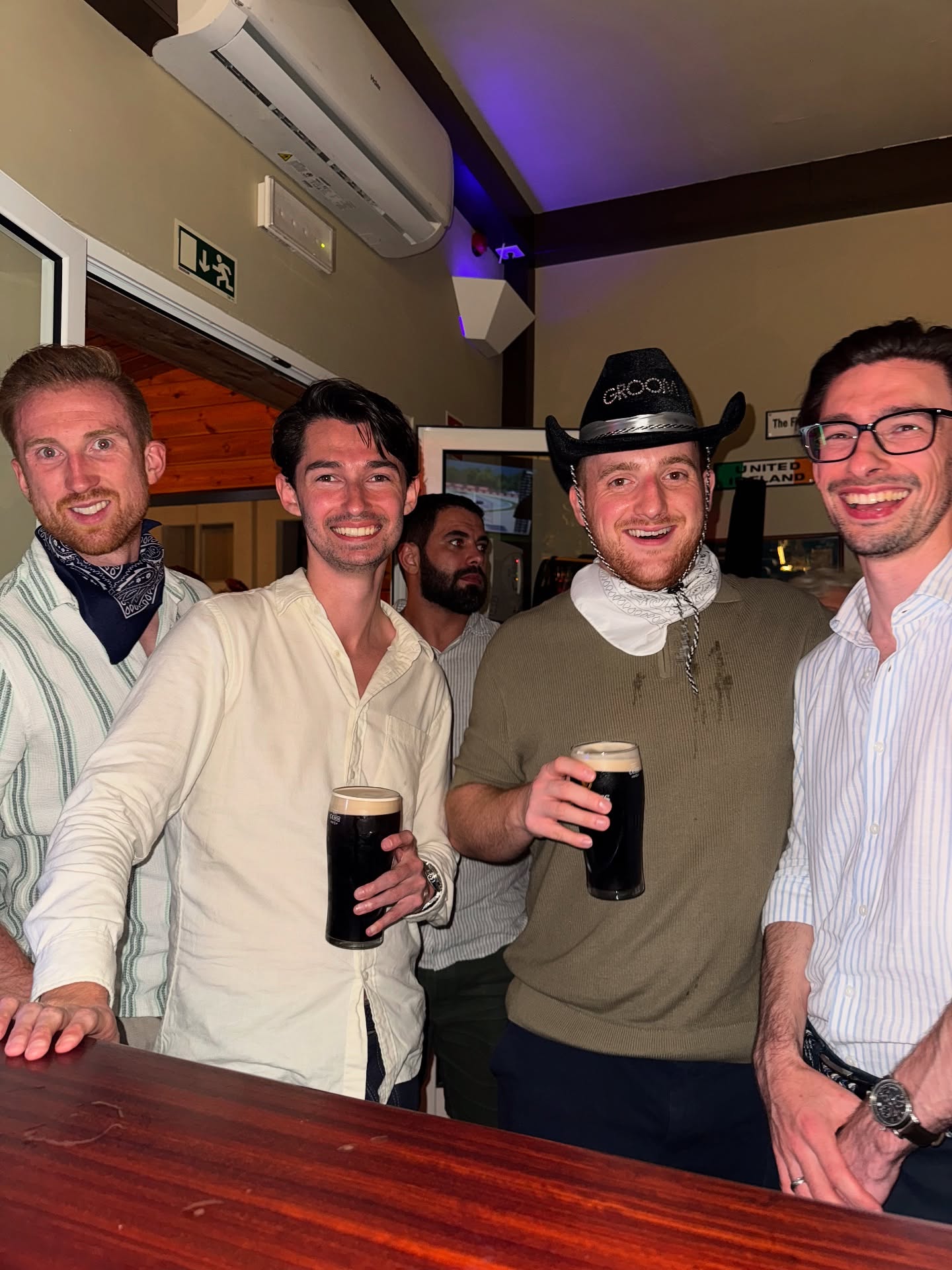 Group celebrating at the bar